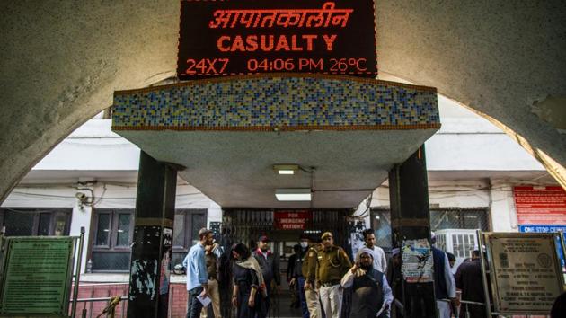 People seen outside a casualty ward at the Guru Teg Bahadur Hospital in Delhi. Mohammed Imran said he had been waiting at the morgue nearly 48 hours after his 32-year-old younger brother Mohammed Furqan bled out from a bullet wound to the leg. Imran said the violence appeared pre-planned, as the police failed to act while outsiders with guns entered a neighbourhood where Hindus and Muslims had long coexisted peacefully. (Prashanth Vishwanathan / Bloomberg)