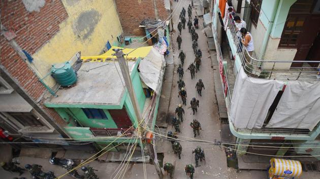 Security personnel patrol the streets following communal violence over the Citizenship amendment Act, at Jafrabad in New Delhi on Thursday.(Amal KS/HT Photo)