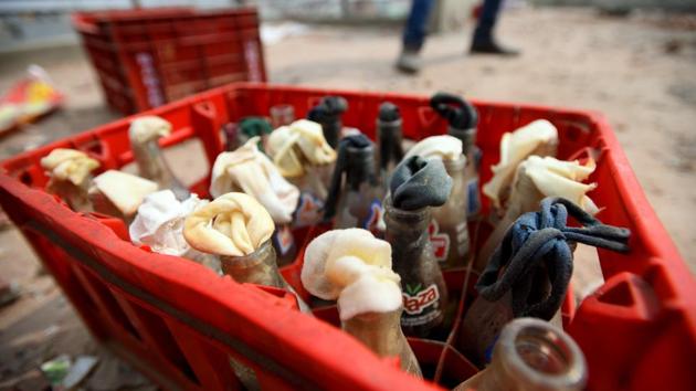 A crate of Molotov cocktails seen at the premises of AAP councillor Tahir Hussain after communal violence over the Citizenship amendment Act at Karawal Nagar in New Delhi.(Amal KS/HT PHOTO) A crate of Molotov cocktails seen at the premises of AAP councillor Tahir Hussain after communal violence over the Citizenship amendment Act at Karawal Nagar in New Delhi.(Amal KS/HT PHOTO)