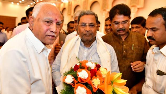 Former Karnataka CM and Congress leader Siddaramaiah with Karnataka Chief Minister BS Yediyurappa.(ANI PHOTO.) Former Karnataka CM and Congress leader Siddaramaiah with Karnataka Chief Minister BS Yediyurappa.(ANI PHOTO.)
