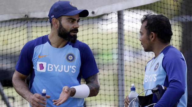 India's Virat Kohli, left, gestures as he talks with teammate India's Prithvi Shaw ahead of the second cricket test against New Zealand in Christchurch, New Zealand, Friday, Feb. 28, 2020.(AP)