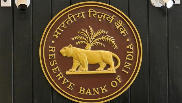 CCTV cameras are seen installed above the logo of Reserve Bank of India (RBI) inside its headquarters in Mumbai.(REUTERS) CCTV cameras are seen installed above the logo of Reserve Bank of India (RBI) inside its headquarters in Mumbai.(REUTERS)