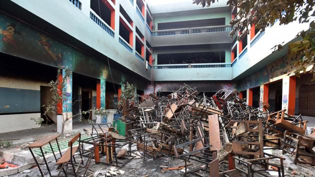 A view of a school following violent clashes over the new citizenship law, at Shiv Vihar, in New Delhi.(Raj K Raj/HT PHOTO)