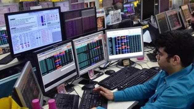 West Bengal, Jan 09 (ANI): Traders work on the floor as Sensex and nifty reach highest in share market, in Kolkata on Thursday. (ANI Photo) West Bengal, Jan 09 (ANI): Traders work on the floor as Sensex and nifty reach highest in share market, in Kolkata on Thursday. (ANI Photo)