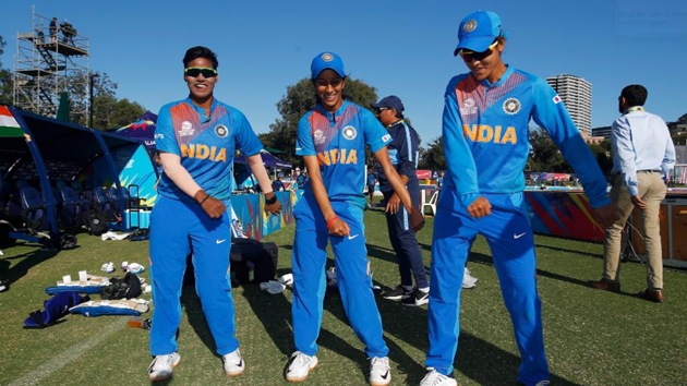 Indian players shake their legs after the match.