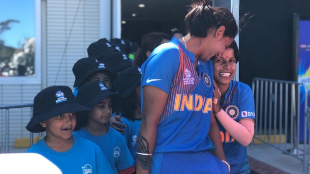 Harmanpreet Kaur shares a light moment with Poonam Yadav.