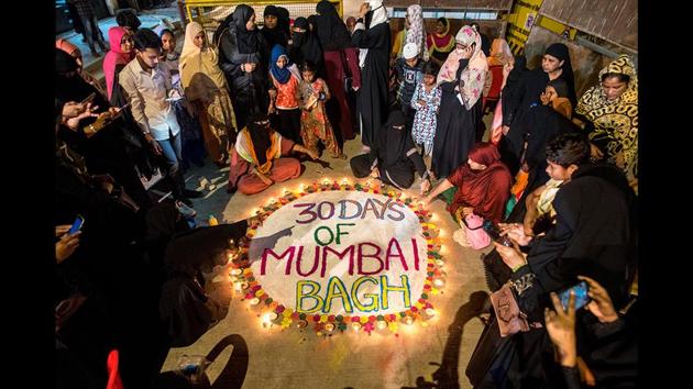 Women make a rangoli on the 30th day of the sit-in protest at Mumbai Bagh in Mumbai Central. (Satyabrata Tripathy / HT Photo) Women make a rangoli on the 30th day of the sit-in protest at Mumbai Bagh in Mumbai Central. (Satyabrata Tripathy / HT Photo)