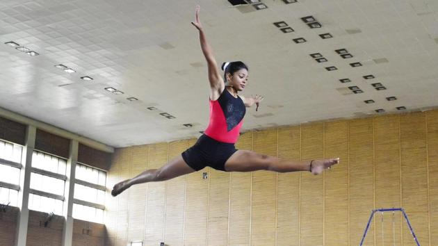 A gymnast participates in the inter-college gymnastic championship at Guru Nanak Dev University in Amritsar. (Sameer Sehgal / HT Photo) A gymnast participates in the inter-college gymnastic championship at Guru Nanak Dev University in Amritsar. (Sameer Sehgal / HT Photo)