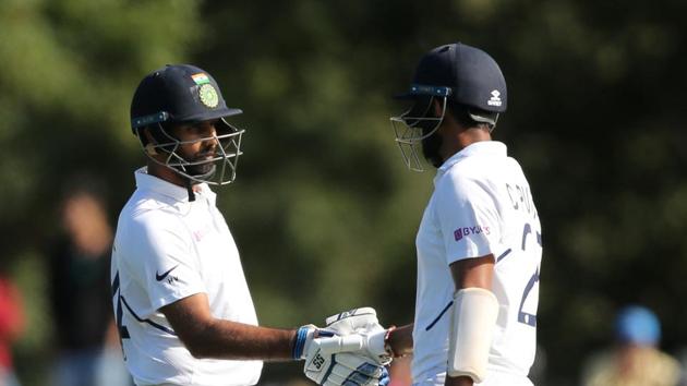 Cricket - New Zealand v India - Second Test - Hagley Oval, Christchurch, New Zealand - February 29, 2020 India's Hanuma Vihari celebrates his half century with teammate Cheteshwar Pujara.(REUTERS) Cricket - New Zealand v India - Second Test - Hagley Oval, Christchurch, New Zealand - February 29, 2020 India's Hanuma Vihari celebrates his half century with teammate Cheteshwar Pujara.(REUTERS)