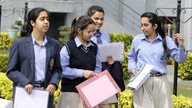 Students come out of an examination centre after appearing for the Class 12 English CBSE paper in Noida. (HT PHOTO.) Students come out of an examination centre after appearing for the Class 12 English CBSE paper in Noida. (HT PHOTO.)