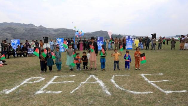 Afghan children celebrate in anticipation of the US-Taliban agreement to allow a US troop reduction and a permanent ceasefire, in Jalalabad, Afghanistan on February 28, 2020. (Reuters Photo) Afghan children celebrate in anticipation of the US-Taliban agreement to allow a US troop reduction and a permanent ceasefire, in Jalalabad, Afghanistan on February 28, 2020. (Reuters Photo)