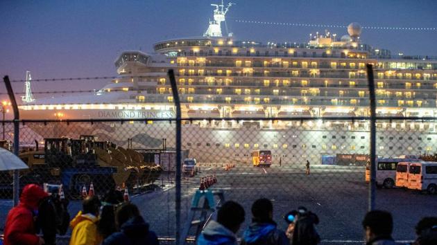 A bus arrives near the cruise ship Diamond Princess, where dozens of passengers were tested positive for coronavirus, at Daikoku Pier Cruise Terminal in Yokohama, south of Tokyo, Japan(REUTERS FILLLE) A bus arrives near the cruise ship Diamond Princess, where dozens of passengers were tested positive for coronavirus, at Daikoku Pier Cruise Terminal in Yokohama, south of Tokyo, Japan(REUTERS FILLLE)