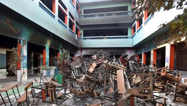 Remnants of a school following violent clashes over the new citizenship law at Shiv Vihar in New Delhi.(RAJ K RAJ/HT PHOTO.)