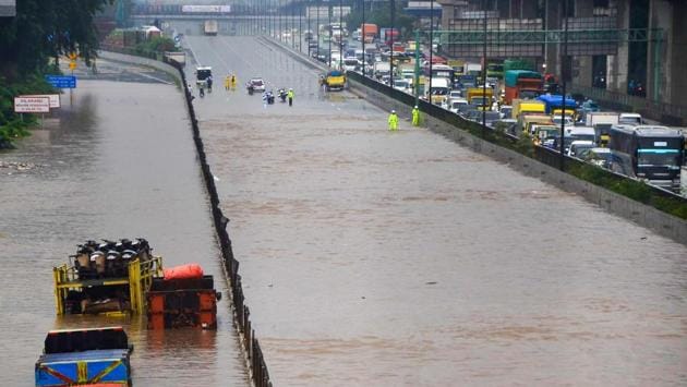 Motorists are seen trapped on a flooded toll road after heavy rain in Bekasi, West Java, Indonesia. Dozens of Jakarta neighbourhoods were flooded after torrential rains pounded Indonesia's capital, less than two months after nearly 70 people were killed in some of the megacity's worst flooding in years. (Rezas / AFP)