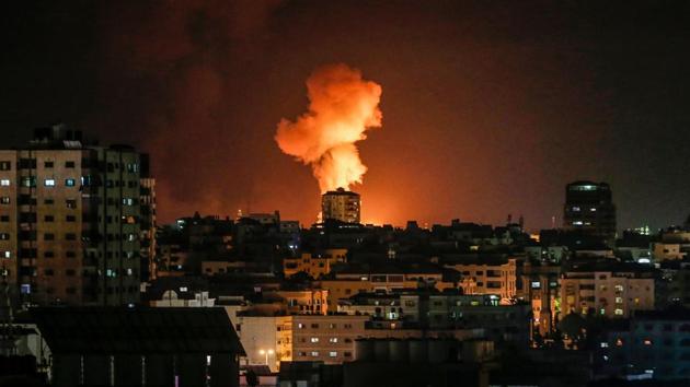 An explosion following an Israeli airstrike on Gaza City. Gaza militant group Islamic Jihad announced the end of its "military response" against Israel after a two-day exchange of fire just a week before the Jewish state's March 2 election. (Mahmud Hamns / AFP)