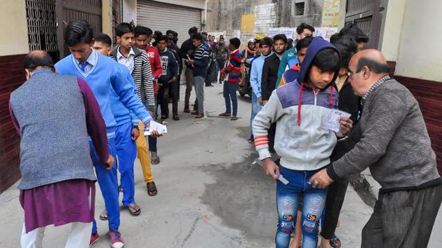 Moradabad: Security personnel frisk examinees before entering the examination hall to appear in the Uttar Pradesh Madhyamik Shiksha Parishad (UPMSP Board) high school (class 10th) and intermediate (class 12th) exams(PTI) Moradabad: Security personnel frisk examinees before entering the examination hall to appear in the Uttar Pradesh Madhyamik Shiksha Parishad (UPMSP Board) high school (class 10th) and intermediate (class 12th) exams(PTI)