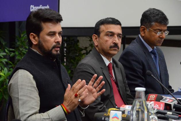 Minister of state for finance and corporate affairs Anurag Thakur addressing mediapersons at CII’s northern region headquarters in Sector 31, Chandigarh, on Sunday.(HT PHOTO)