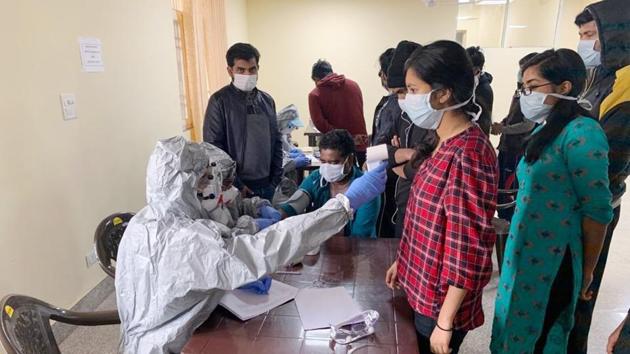 Indian nationals undergoing final sample collection and tests inside a quarantine facility set by up ITBP, at Chhawla area of New Delhi.(HT Photo) Indian nationals undergoing final sample collection and tests inside a quarantine facility set by up ITBP, at Chhawla area of New Delhi.(HT Photo)
