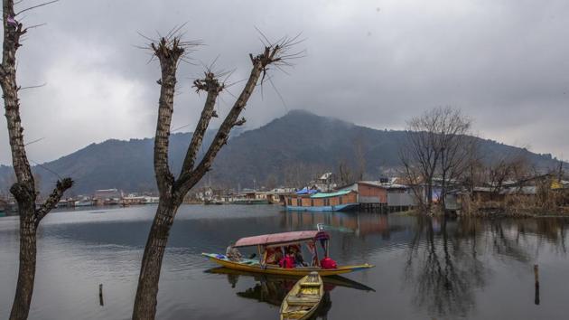 Tourists ride a Shikara, or a traditional boat, on the Dal Lake in Srinagar, Kashmir. (AP) Tourists ride a Shikara, or a traditional boat, on the Dal Lake in Srinagar, Kashmir. (AP)