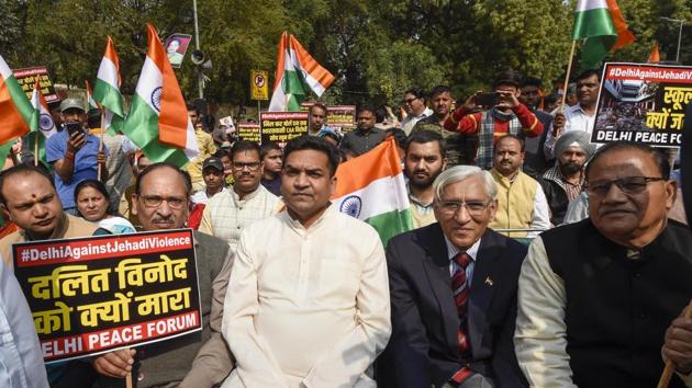 BJP leader Kapil Mishra participates in a peace march to protest against communal violence in Northeast Delhi, at Jantar Mantar, in New Delhi.(PTI)