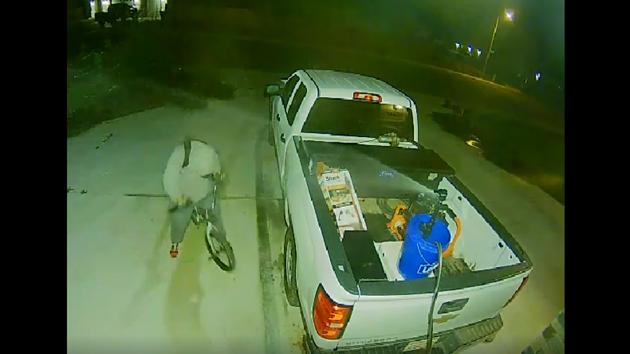 The clip, recorded on security camera, shows a man riding his bike towards the family’s truck. (Facebook/ Katie Camarena) The clip, recorded on security camera, shows a man riding his bike towards the family’s truck. (Facebook/ Katie Camarena)