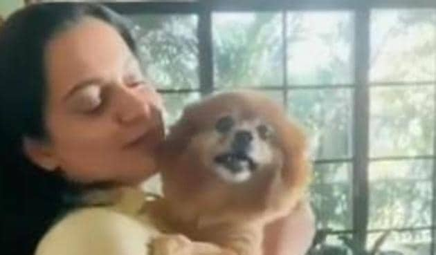 Kangana is all smiles as she hugs her pet dog Pluto after a month.