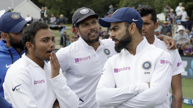 India's Virat Kohli, right, talks with his teammates following play on day three of the second cricket test between New Zealand and India at Hagley Oval in Christchurch. (AP) India's Virat Kohli, right, talks with his teammates following play on day three of the second cricket test between New Zealand and India at Hagley Oval in Christchurch. (AP)