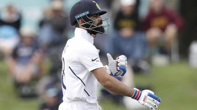 India's Virat Kohli walks from the field after he was dismissed.(AP)