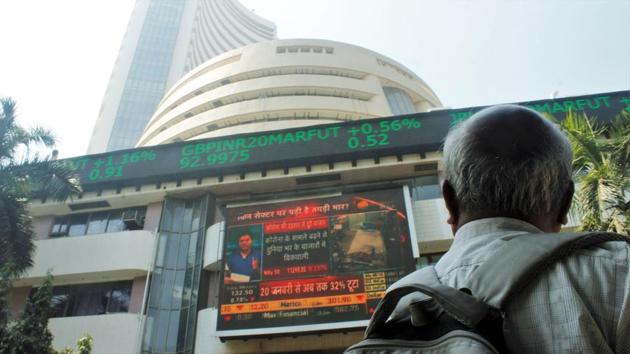 A man looks at a screen displaying the Sensex on the facade of the Bombay Stock Exchange (BSE) building in Mumbai. (ANI) A man looks at a screen displaying the Sensex on the facade of the Bombay Stock Exchange (BSE) building in Mumbai. (ANI)