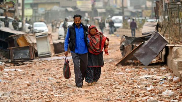 In Karawal Nagar, people were seen leaving the area following the communal violence on February 27. (Amal KS / HT Photo)