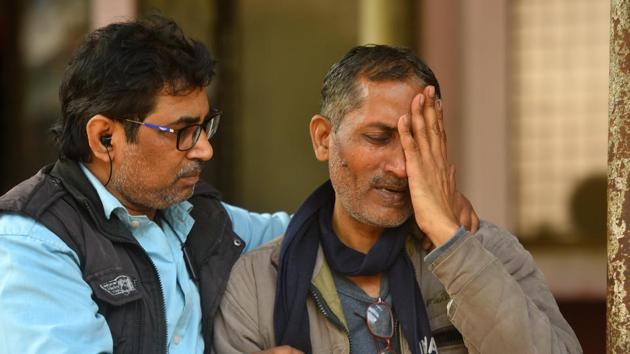 Father of a boy, who was killed during communal violence in northeast Delhi area, breaks down as he waits to receive his body outside GTB hospital mortuary, in New Delhi. (Amal KS/HT PHOTO) Father of a boy, who was killed during communal violence in northeast Delhi area, breaks down as he waits to receive his body outside GTB hospital mortuary, in New Delhi. (Amal KS/HT PHOTO)