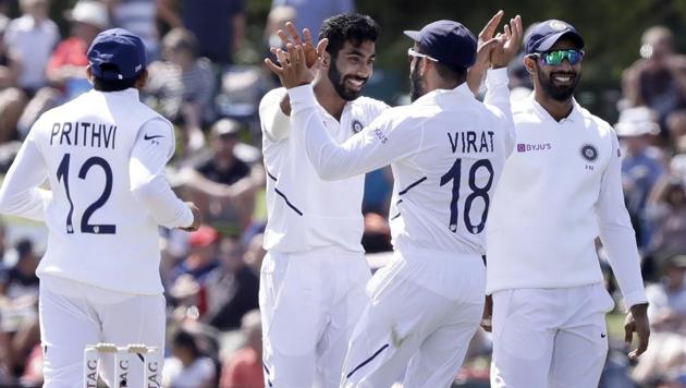 India's Jasprit Bumrah, centre, is congratulated by his captain Virat Kohli(AP) India's Jasprit Bumrah, centre, is congratulated by his captain Virat Kohli(AP)