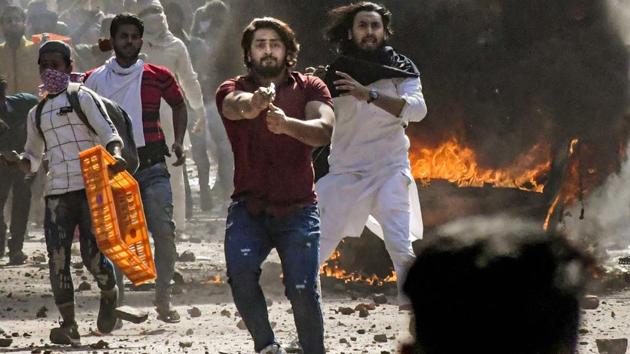 In this Feb. 24, 2020 file photo, Shahrukh brandishes a pistol during Delhi violence in Northeast Delhi’s Jafrabad. (PTI File Photo) In this Feb. 24, 2020 file photo, Shahrukh brandishes a pistol during Delhi violence in Northeast Delhi’s Jafrabad. (PTI File Photo)