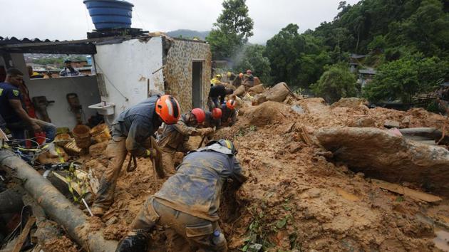 A storm that pummeled Brazil’s south-eastern coast killed at least 16 people and dozens were missing.(AP)