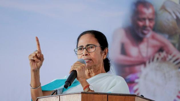 West Bengal Chief Minister Mamata Banerjee addresses an administrative review meeting at Kaliyaganj in North Dinajpur district, on Tuesday.(PTI Photo)