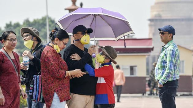 A group of visitors seen wearing protective masks following positive cases of coronavirus in the country, in New Delhi, Wednesday, March 4, 2020.(Burhaan Kinu/HT PHOTO) A group of visitors seen wearing protective masks following positive cases of coronavirus in the country, in New Delhi, Wednesday, March 4, 2020.(Burhaan Kinu/HT PHOTO)