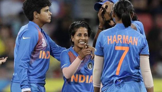India's Poonam Yadav, center, is congratulated by teammates(AP)