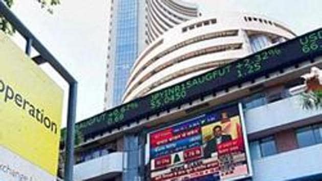 Sensex ended 214 points lower after a highly volatile session on Wednesday. (PTI) Sensex ended 214 points lower after a highly volatile session on Wednesday. (PTI)