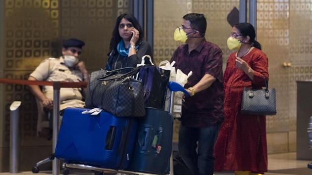 People wearing face mask as protection against coronavirus, arrive at Chhatrapati Shivaji Maharaj International Airport on Wednesday. (Satyabrata Tripathy/HT Photo) People wearing face mask as protection against coronavirus, arrive at Chhatrapati Shivaji Maharaj International Airport on Wednesday. (Satyabrata Tripathy/HT Photo)
