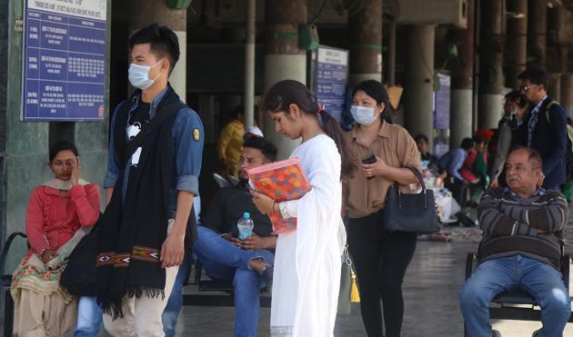 TAKING NO CHANCES: Passengers wearing masks as a precaution, at the ISBT in Sector 17, Chandigarh, on Wednesday. (SANJEEV SHARMA/HT) TAKING NO CHANCES: Passengers wearing masks as a precaution, at the ISBT in Sector 17, Chandigarh, on Wednesday. (SANJEEV SHARMA/HT)