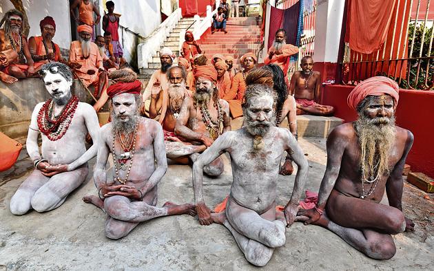 Sadhus performing yoga to mark International Yoga Day at Kamakhya Temple in Guwahati on June 21, 2018. (Biju Boro/AFP) Sadhus performing yoga to mark International Yoga Day at Kamakhya Temple in Guwahati on June 21, 2018. (Biju Boro/AFP)