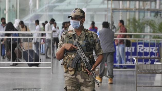 A security personnel is seen wearing a protective mask following positive cases of coronavirus in the country, at Chaudhary Charan Singh International Airport, in Lucknow, Uttar Pradesh, India, on Wednesday, March 4, 2020.(Photo: Deepak Gupta / Hindustan Times)