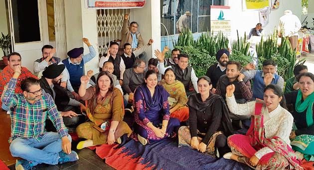 Members of the Punjabi University Teachers’ Association (PUTA) holding a protest against university management. (Bharat Bhushan/HT) Members of the Punjabi University Teachers’ Association (PUTA) holding a protest against university management. (Bharat Bhushan/HT)