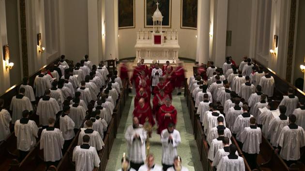 Seminarians and faculty file out from Mass at St. Charles Borromeo Seminary in Wynnewood. They walk along a hallway lined with photos of classes of priests who came before them. Some are pious alumni who have become their teachers and mentors; others climbed the Catholic hierarchy to be revered as bishops and cardinals. But after the sexual abuse crisis in the Catholic Church, seminaries say they have tightened screening of applicants. (Wong Maye-E / AP) Seminarians and faculty file out from Mass at St. Charles Borromeo Seminary in Wynnewood. They walk along a hallway lined with photos of classes of priests who came before them. Some are pious alumni who have become their teachers and mentors; others climbed the Catholic hierarchy to be revered as bishops and cardinals. But after the sexual abuse crisis in the Catholic Church, seminaries say they have tightened screening of applicants. (Wong Maye-E / AP)