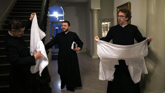 Seminarians gather after the conclusion of an afternoon Mass at St. Charles Borromeo Seminary. The landmark 2018 Pennsylvania grand jury report and a cascade of subsequent revelations around the globe brought back with ferocity a sexual abuse crisis that never fully went away. (Wong Maye-E / AP) Seminarians gather after the conclusion of an afternoon Mass at St. Charles Borromeo Seminary. The landmark 2018 Pennsylvania grand jury report and a cascade of subsequent revelations around the globe brought back with ferocity a sexual abuse crisis that never fully went away. (Wong Maye-E / AP)