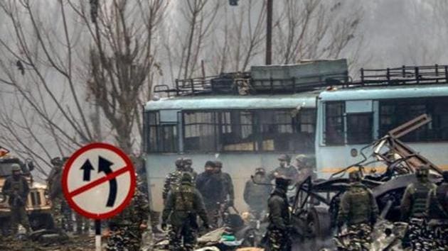 Security personnel carry out the rescue and relief works at the site of suicide bomb attack at Lathepora Awantipora in Pulwama district of south Kashmir on February 14, 2019. (PTI) Security personnel carry out the rescue and relief works at the site of suicide bomb attack at Lathepora Awantipora in Pulwama district of south Kashmir on February 14, 2019. (PTI)