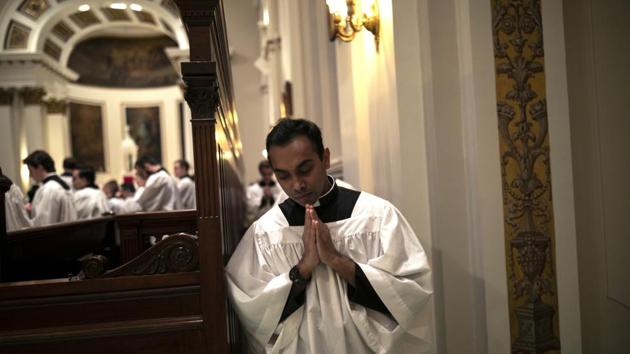 Seminarian Ranjuna Perera from the Archdiocese of Colombo, Sri Lanka, returns to his seat after receiving communion at St. Charles Borromeo Seminary in Wynnewood. Seminarians speak with excitement of becoming Catholic priests who minister to the faithful at defining moments of their lives. (Wong Maye-E / AP) Seminarian Ranjuna Perera from the Archdiocese of Colombo, Sri Lanka, returns to his seat after receiving communion at St. Charles Borromeo Seminary in Wynnewood. Seminarians speak with excitement of becoming Catholic priests who minister to the faithful at defining moments of their lives. (Wong Maye-E / AP)