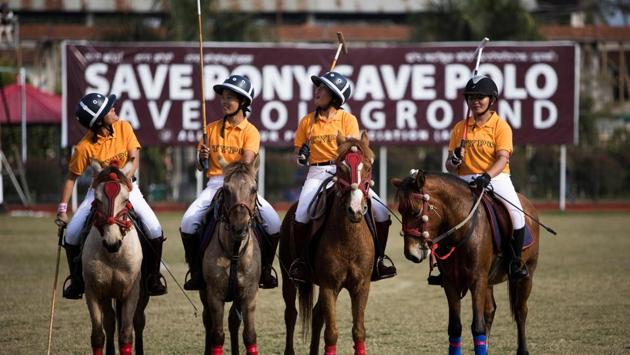 Thangmeiband Youth Polo Club players line up before their match against Linthoingambi Kangjei Lup polo club during the 15th Women’s State Polo Tournament. Manipur, in the foothills of the Himalayas, has produced some of India’s top athletes including champion boxer Mary Kom. (Xavier Galiana / AFP) Thangmeiband Youth Polo Club players line up before their match against Linthoingambi Kangjei Lup polo club during the 15th Women’s State Polo Tournament. Manipur, in the foothills of the Himalayas, has produced some of India’s top athletes including champion boxer Mary Kom. (Xavier Galiana / AFP)