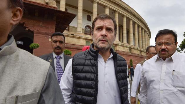 Congress leader Rahul Gandhi wears a blank band to protest against the suspension of seven party MPs from the Lok Sabha, at Parliament during the ongoing Budget Session, in New Delhi.(PTI)