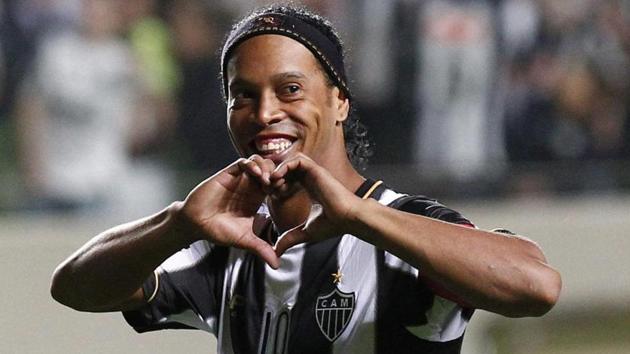 Brazil's Atletico Mineiro's Ronaldinho celebrates his team's victory over Argentina's Newell's Old Boys at the end of a Copa Libertadores. (AP) Brazil's Atletico Mineiro's Ronaldinho celebrates his team's victory over Argentina's Newell's Old Boys at the end of a Copa Libertadores. (AP)